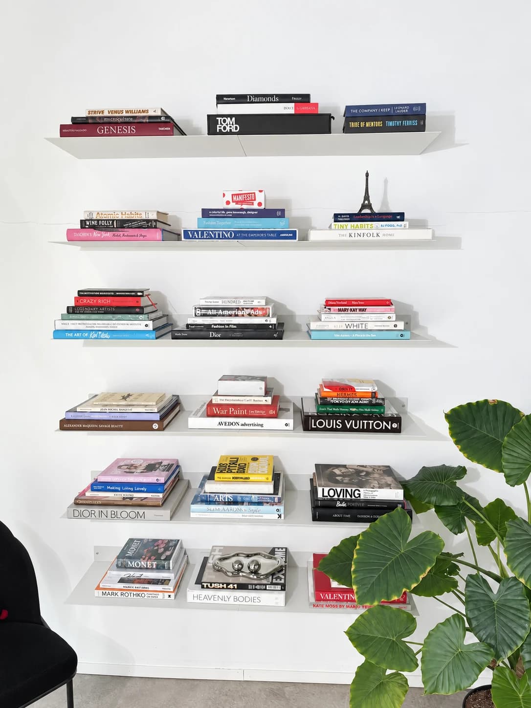 Fashion, beauty, and design books displayed on shelves inside Beauty Cafe