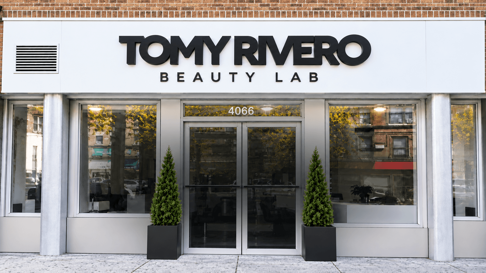 Full exterior of the Tomy Rivero Beauty Lab storefront on Broadway in Washington Heights