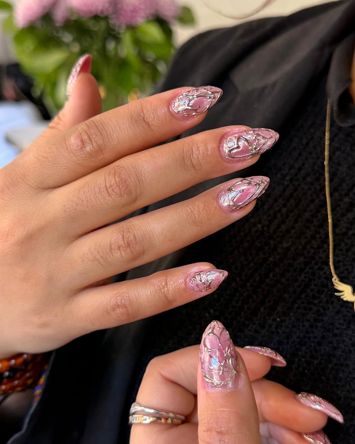 Pink marble nails with silver foil detailing